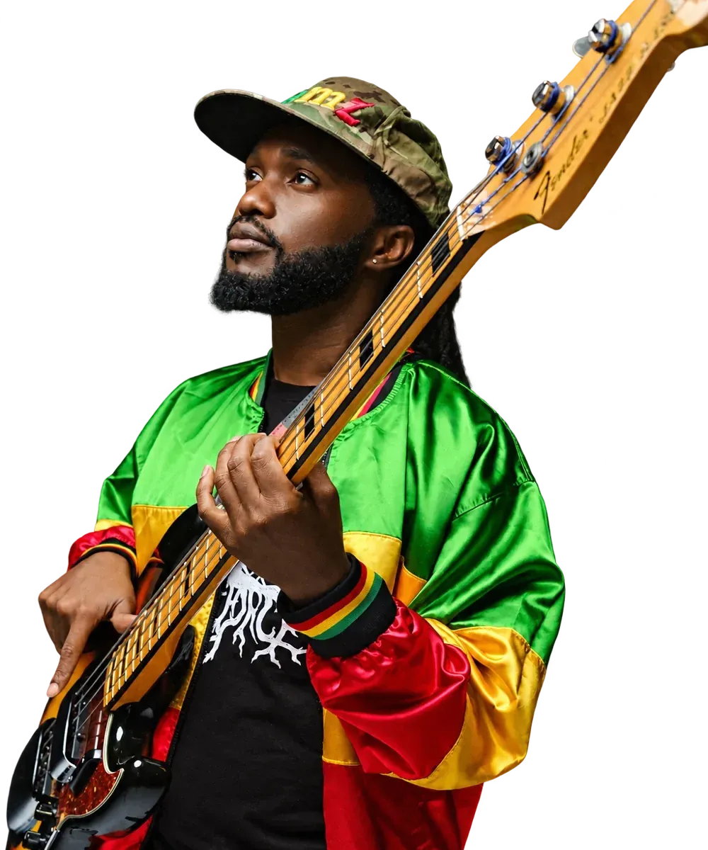Aston Barrett Jr. holding his bass guitar